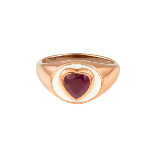 The Treasures Heart Ring On A White Enamel Base